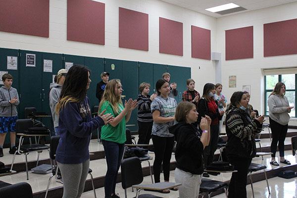 Middle School Choir practicing a song.